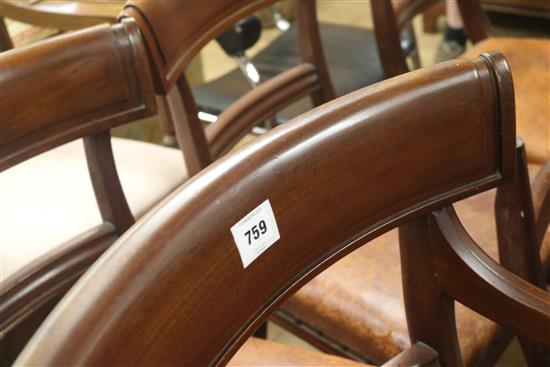 A set of seven early Victorian leather seat dining chairs